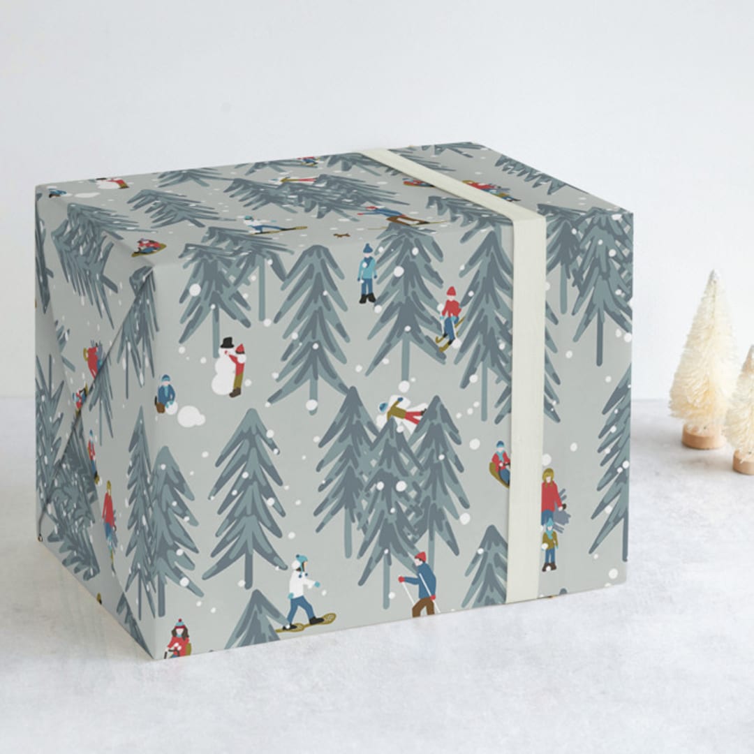 "Winter Play" - Wrapping Paper in Glacier by Meggy Masters - Front