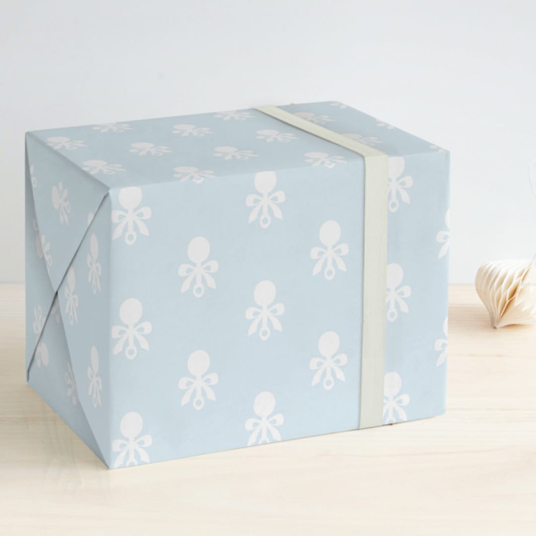 "Petite Rattle" - Wrapping Paper in Cornflower by Robin Ott - Front