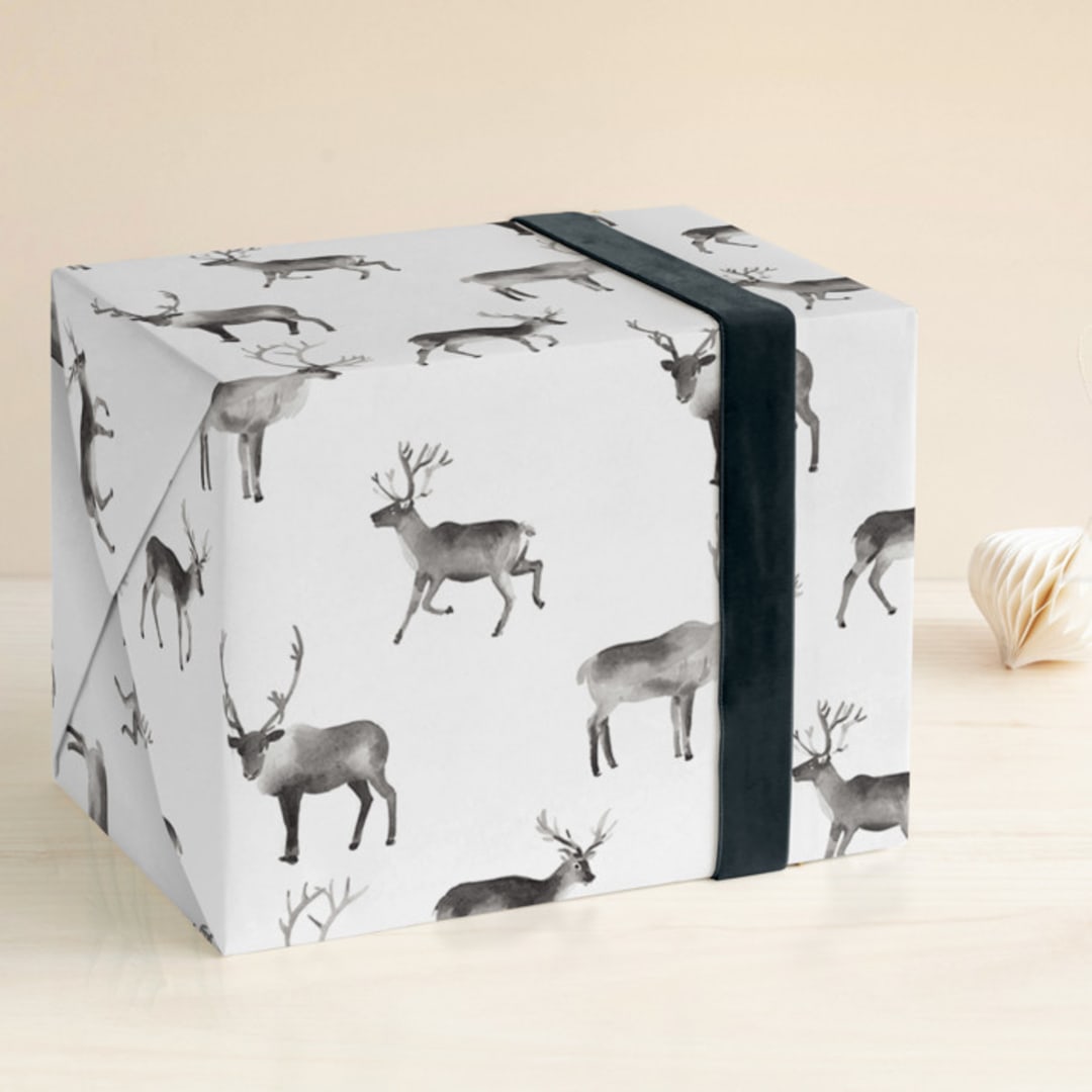 "Reindeer Feet" - Wrapping Paper in Charcoal by Rebecca Daublin - Front