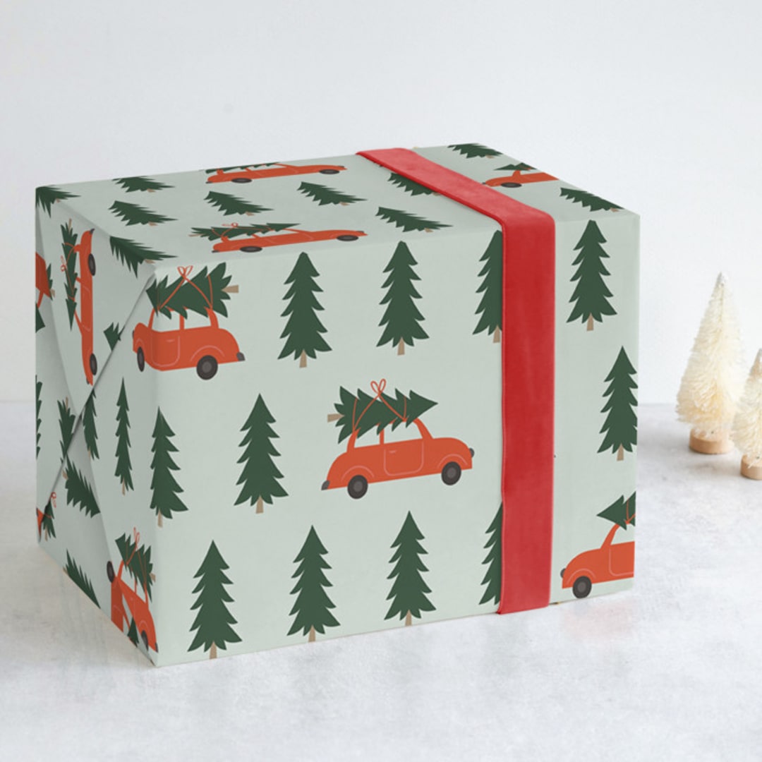 "Tree Lot" - Wrapping Paper in Red by Joyce Pinheiro - Front