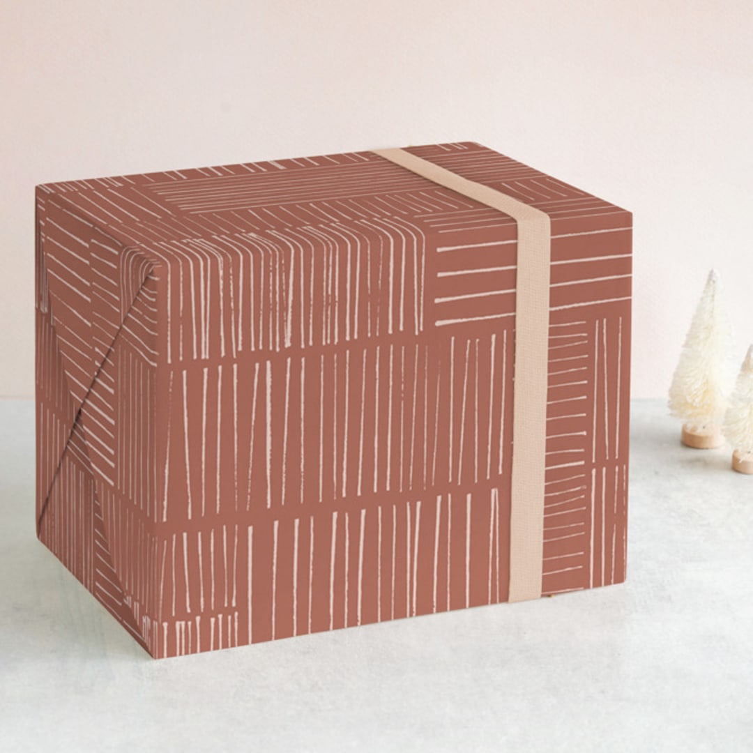 "Stick Stacked" - Wrapping Paper in Terracotta by Kelly Williams - Front