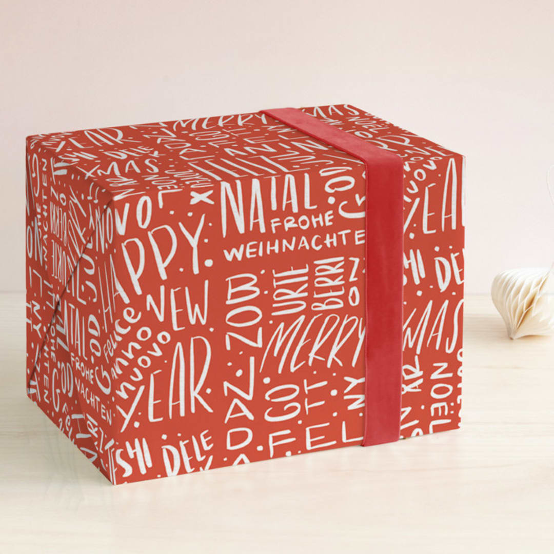 "One World" - Wrapping Paper in Santa Suit by Claudia Orengo - Front