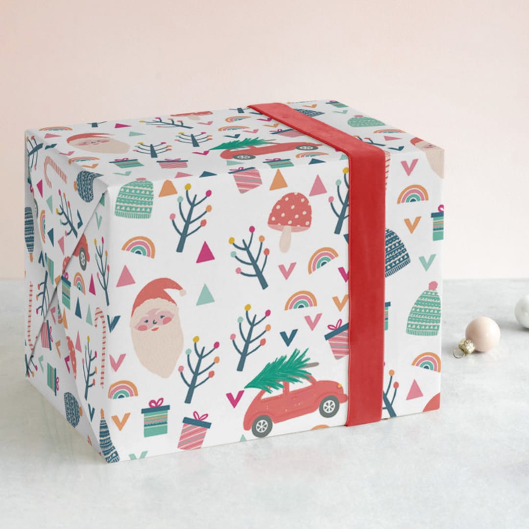 "Holiday Icons" - Wrapping Paper in Cream by Rebecca Humphreys - Front