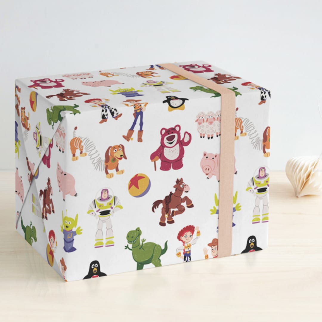 "Andy's Toys from Disney and Pixar" - Wrapping Paper in Candy by Rebecca Smith - Front