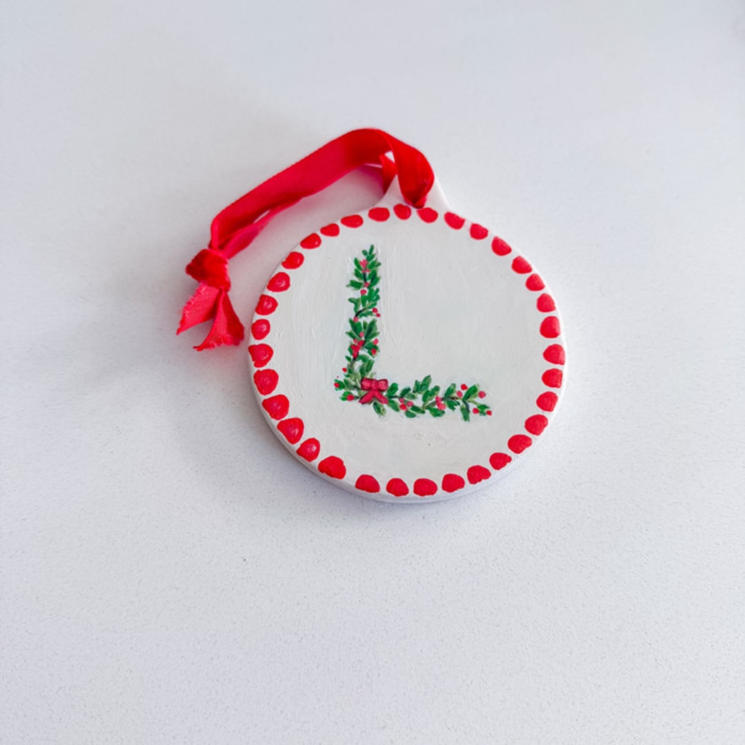 "Custom Initial Ornament" - Ornaments in white by Arohika Verma