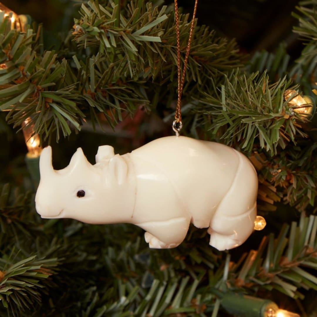 "Mini Tagua Ivory Rhinoceros Ornament" - Ornaments in beige by Aahlada Chennupati