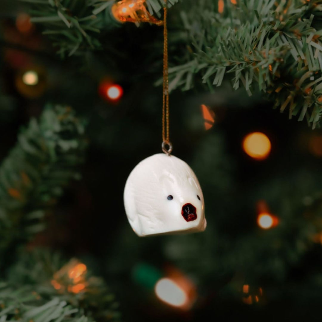 "Mini Tagua Ivory Sitting Hedgehog Ornament" - Ornaments in beige by Aahlada Chennupati