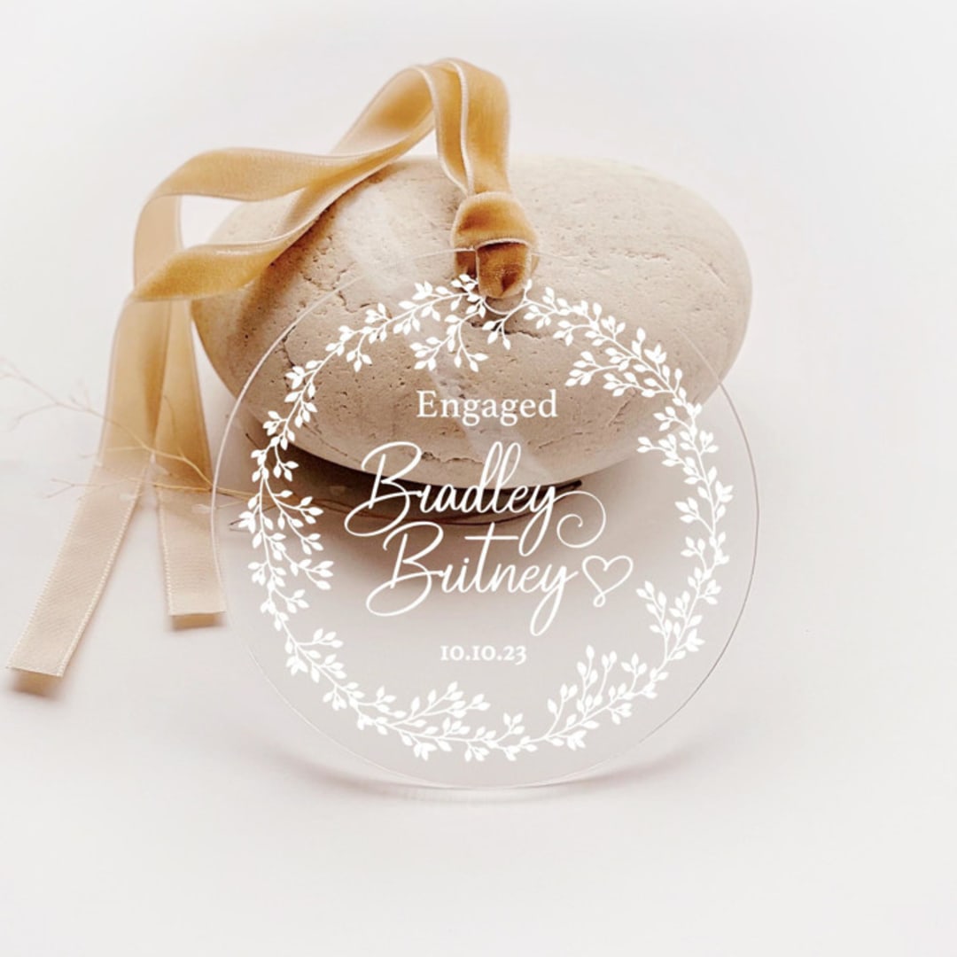 "Personalized Acrylic White Floral Wreath Engagement Ornament, Set of 1" - Ornaments in white by Iveta Abolina