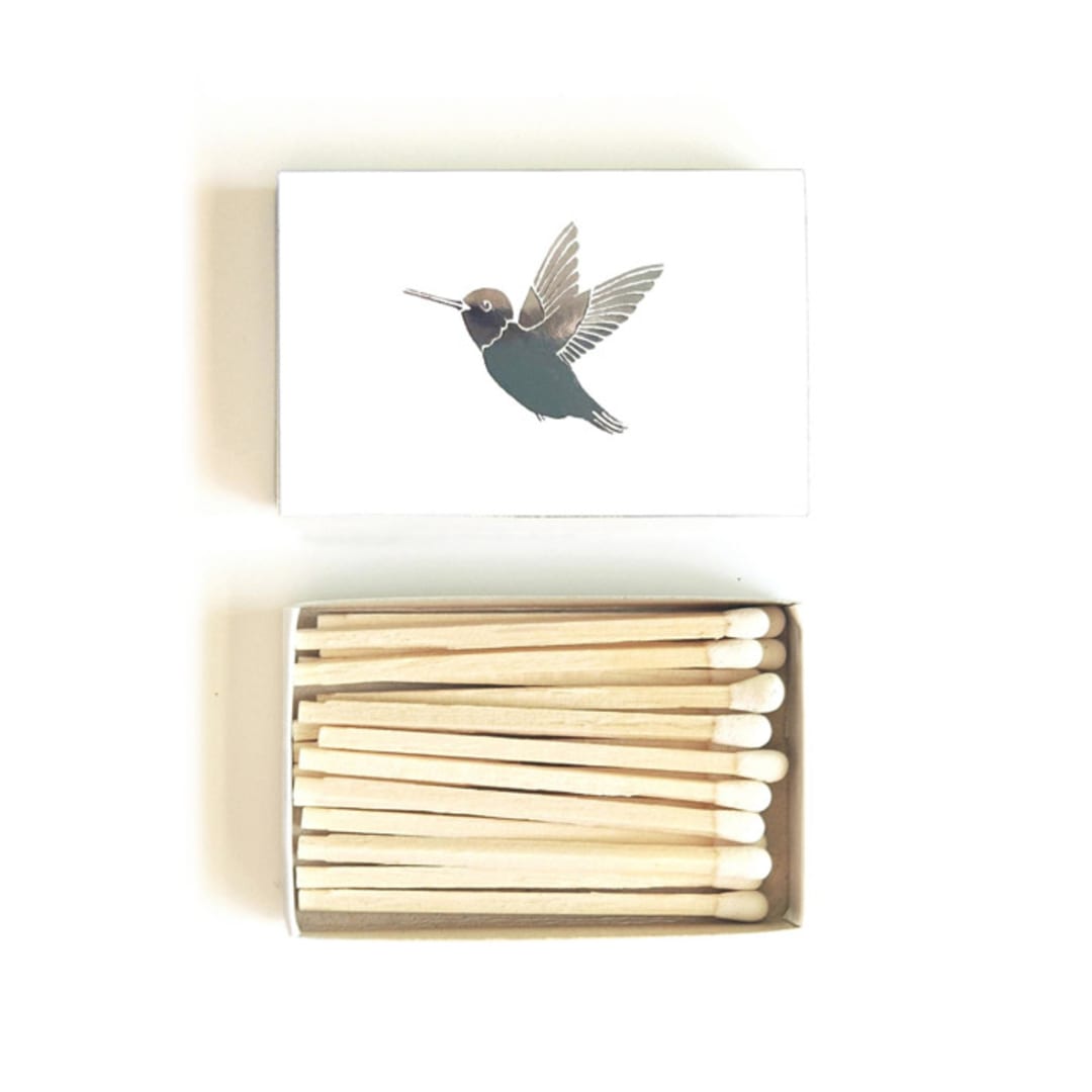 "Hummingbird Matchbox, Silver on White" - Party Matches and Matchbooks in white by Jessica Cunningham