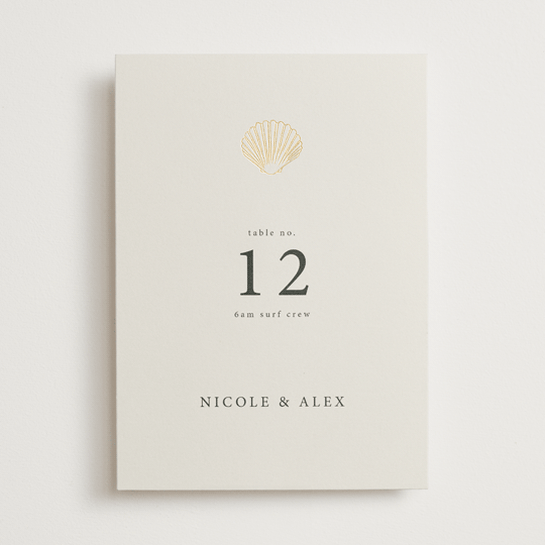 "Simple Seashell" - Table Numbers in Sand by Hannah Bowman - Front