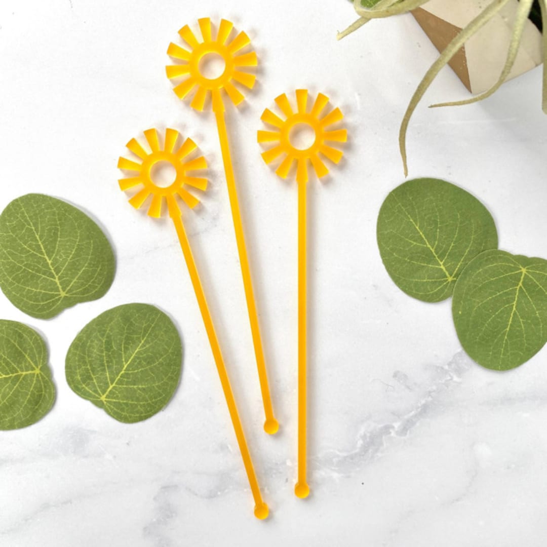 "Mid Mod Sun Stir Sticks - Frosted Daffodil (Set of 25)" - Stir Sticks in black by Atomic Kraftworks