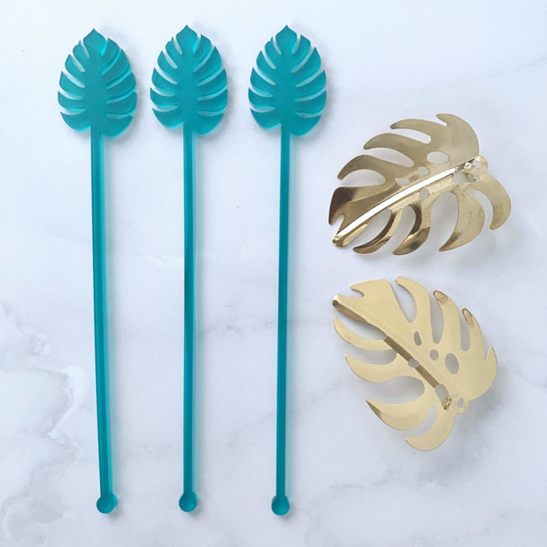 "Monstera Stir Sticks - Frosted Teal (Set of 25)" - Stir Sticks in black by Atomic Kraftworks