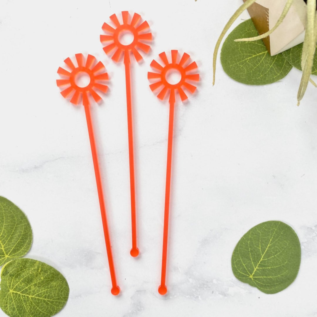 "Mid Mod Sun Stir Sticks - Frosted Poppy (Set of 25)" - Stir Sticks in pink by Atomic Kraftworks