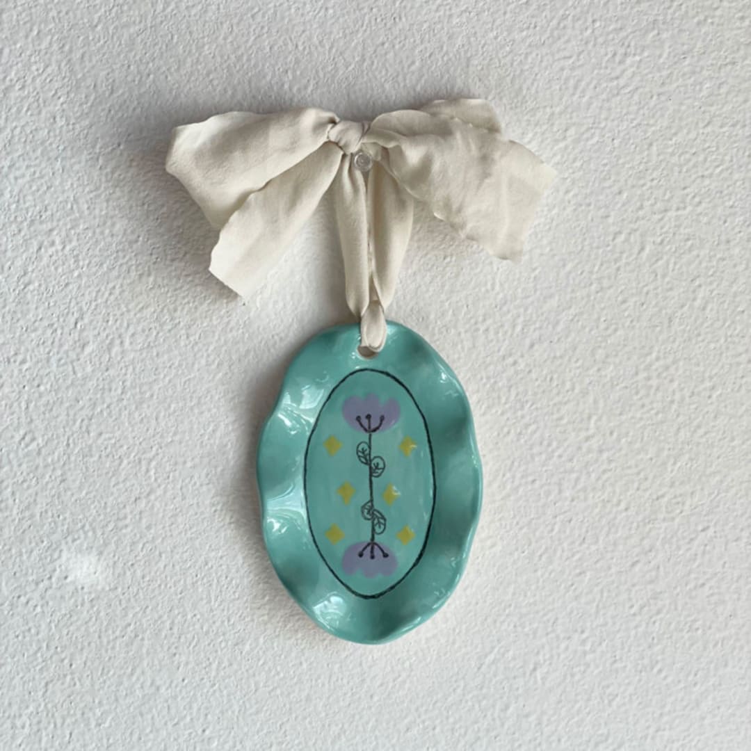 "Floral Ruffle Oval Wall Hanging" - Wall Hanging in green by Quiet Clementine