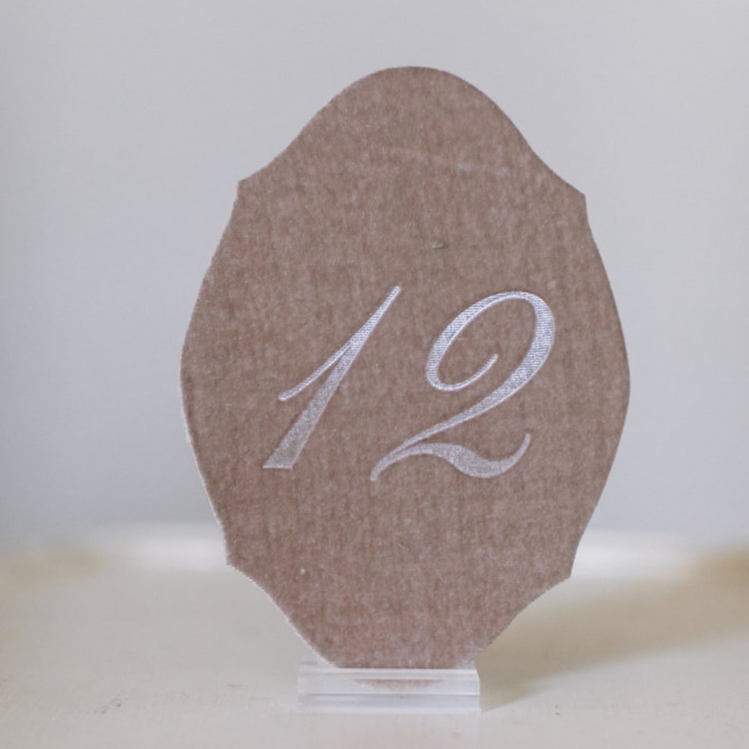 "Mushroom Script Oval Table Number" - Table Numbers in beige by Velvet Raptor