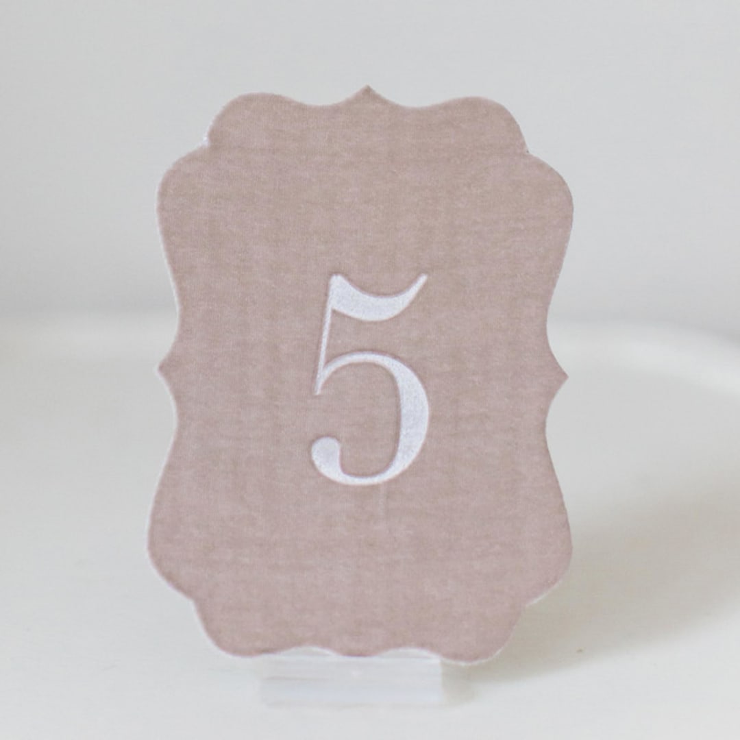 "Scroll Table Numbers - Mushroom" - Table Numbers in beige by Velvet Raptor
