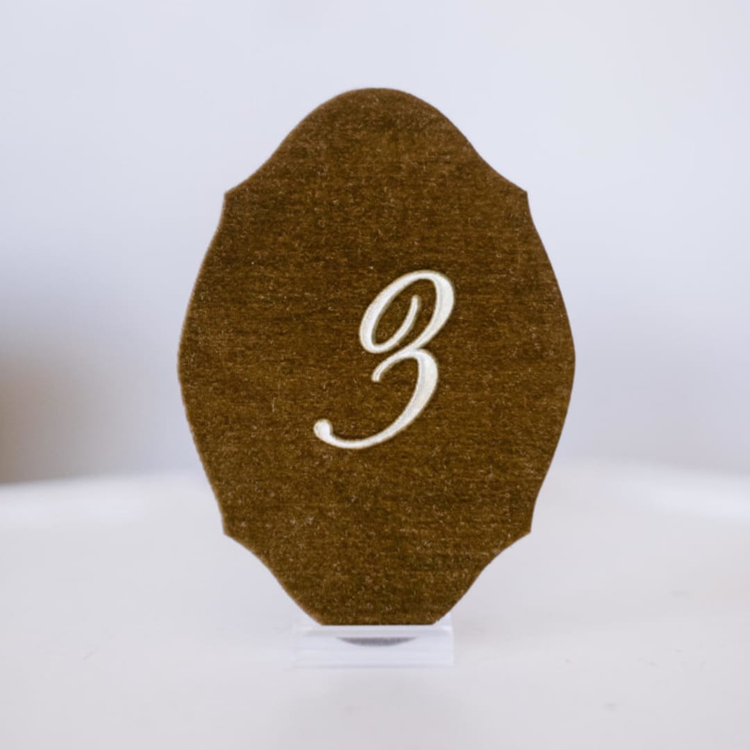 "Script Oval Table Number - Gold" - Table Numbers in gold by Velvet Raptor