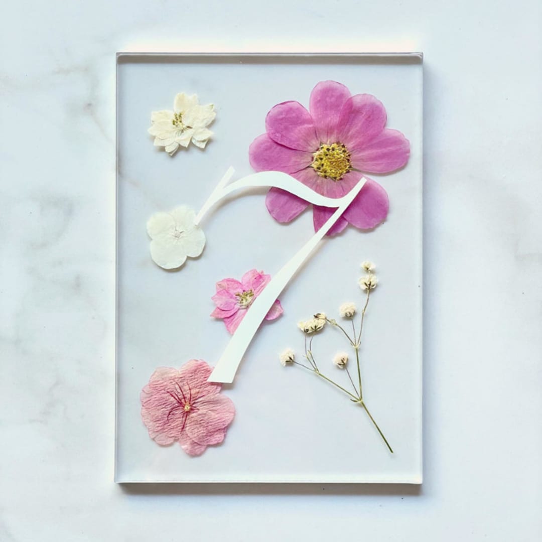 "Silver-Lined Pressed Flower Table Number, Pink" - Table Numbers in white by Jasmine Jhunjhnuwala
