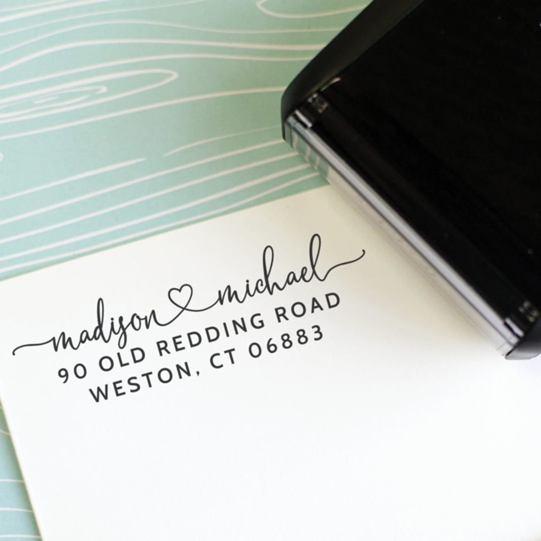 "Custom Address Stamp with first names linked with a heart | Self Inking" - Address Stamps in black by Sara Luke