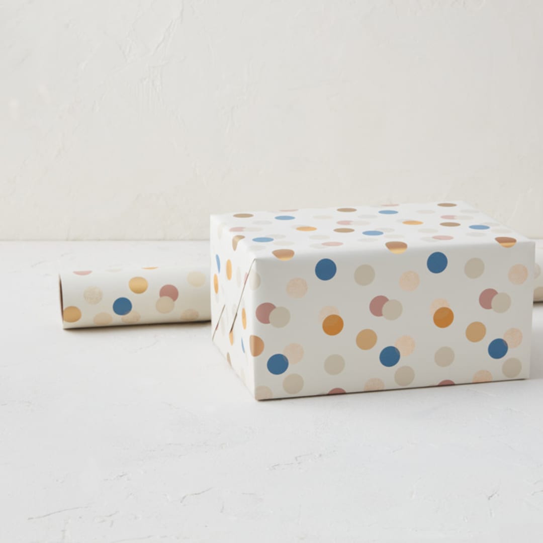"Festive Dots" - Wrapping Paper Roll in Cream by Sumak Studio