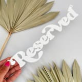 "Reserved Seat Sign • White" - Aisle and Chair Decor in white by Haven Print Co.