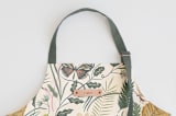 "Folk Butterflies" - Apron in Garden by Morgan Ramberg - Tag in Bodoni Regular