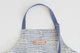 "Dashed Stripes" - Apron in Denim by Alethea and Ruth - Tag in Bodoni Regular