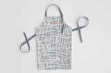 "Wavy" - Apron in Storm by Michelle Taylor - Personalizable Apron