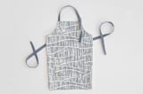 "Wavy" - Apron in Storm by Michelle Taylor - Apron without personalization