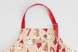"Retro Ornaments" - Apron in Coral by Vivian Yiwing - Tag in Bodoni Regular