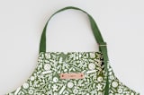 "A Baker's Holiday" - Apron in Sage by Jaclyn Ruble - Tag in Bodoni Regular
