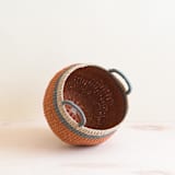 "Coral Bulge Basket" - Decorative Baskets in orange by LIKHA