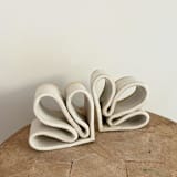"Fleur Bookends" - Bookends in white by Sidney Field