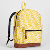 "Sunny Floral" - Backpack in Sunshine by Adrienne Davis - Side and Exterior Pockets