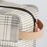 "Sketchy Plaid" - Dopp Kit in Pencil by Katie Wahn - Strap and Zipper Detail