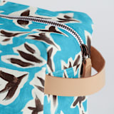 "Birds in Flight" - Dopp Kit in Sky by Michelle Fifis - Strap and Zipper Detail