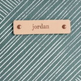 "Line Wrap" - Dopp Kit in Emerald by Michelle Taylor - Tag Detail