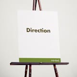 "Portrait Custom" - Direction Signs in Charcoal by Minted - In Use