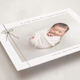 "Crisp Bow" - Holiday Birth Announcement Cards in Cranberry by Olivia Raufman - Detail