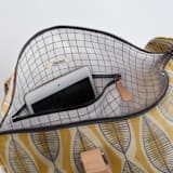 "Yellow Leaves" - Fillmore Duffle in Turmeric by Alisa Galitsyna - Interior Front