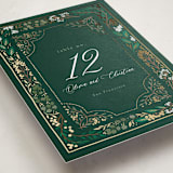 "Illuminated Storybook" - Foil-Pressed Party Table Numbers in Evergreen by Alethea and Ruth - Detail