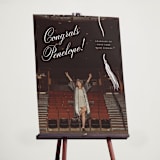 "Tassel Type" - Graduation Welcome Signs in Snow by Pixel and Hank - In Use