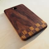 "Checkered Tail Cutting board" - Cutting Boards in black by Koppa Wood