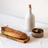 "Olive Wood Bread Slicing Board" - Cutting Boards in beige by Powered By People