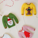 "Colorful Holiday Felt Sweaters Garland" - Garlands in green by Aahlada Chennupati