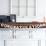 "Congratulations Banner (Off-White, 6 feet)" - Garlands in white by Nivas Collection