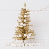 "Winter White Felt Ball Garland" - Garlands in white by aubry bennion