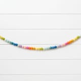 "Rainbow Bright Felt Ball Garland" - Garlands in multicolor by aubry bennion