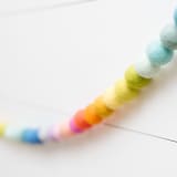 "Rainbow Bright Felt Ball Garland" - Garlands in multicolor by aubry bennion