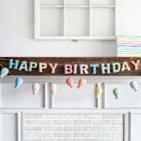 "Happy Birthday Banner (Soft Rainbow, 6 feet)" - Garlands in multicolor by Nivas Collection